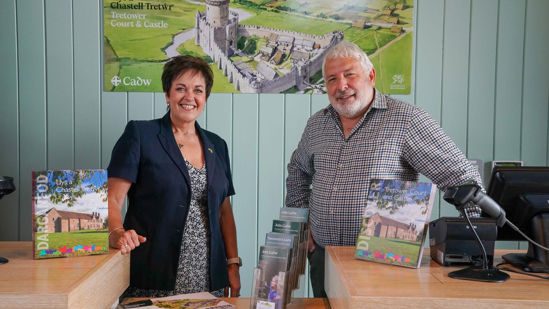 Cadw director Gwilym Hughes and Minister Dawn Bowden inside Tretower Barn